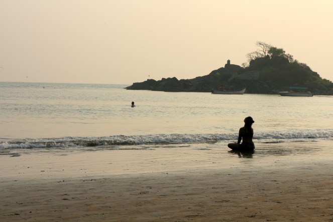 Women Meditating at Om Beach